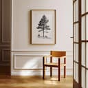 Room view with a matted frame of A vintage pencil sketch, a pine tree