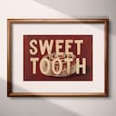 Matted frame view of A vintage linocut print, the words "SWEET TOOTH" with a cinnamon roll