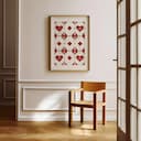 Room view with a matted frame of A vintage textile print, symmetric pattern of hearts and diamonds