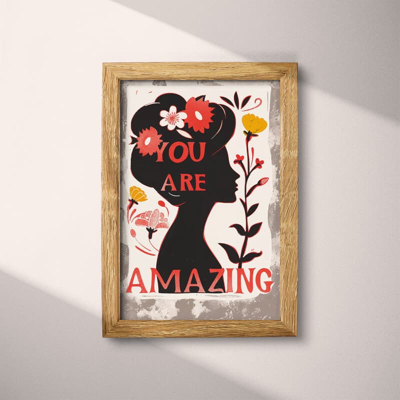 Full frame view of A vintage linocut print, the words "YOU ARE AMAZING" with a silhouette of a woman with flowers in her hair