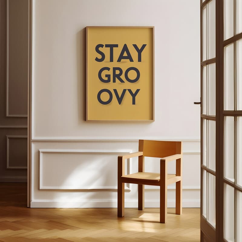 Room view with a full frame of A minimalist poster print, the words "STAY GROOVY"