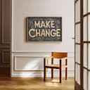 Room view with a full frame of A vintage linocut print, the words "MAKE CHANGE"