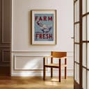 Room view with a matted frame of A vintage linocut print, the words "FARM FRESH" with a chicken