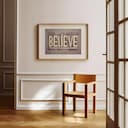 Room view with a matted frame of A vintage linocut print, the word "BELIEVE"