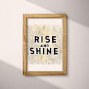 Full frame view of A minimalist linocut print, the words "RISE AND SHINE"