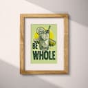 Matted frame view of A vintage linocut print, the words "BE WHOLE" with a glass of lemonade