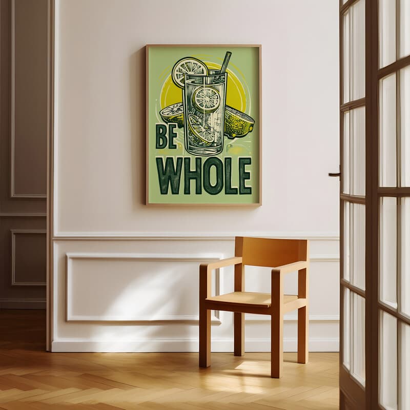 Room view with a full frame of A vintage linocut print, the words "BE WHOLE" with a glass of lemonade