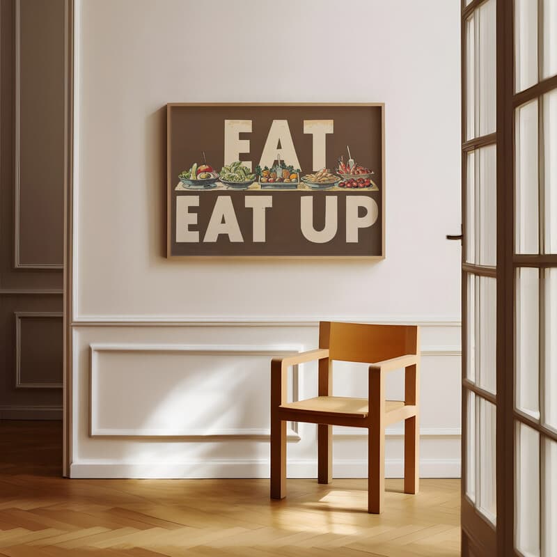 Room view with a full frame of A vintage linocut print, the words "EAT UP" with a buffet of food
