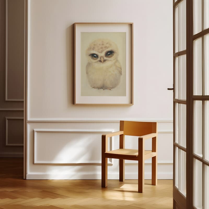 Room view with a matted frame of A cute chibi anime pastel pencil illustration, an owl