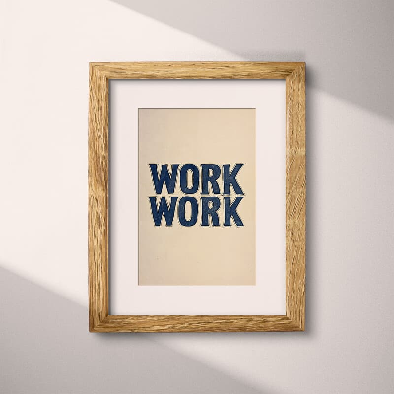 Matted frame view of A minimalist linocut print, the words "WORK"