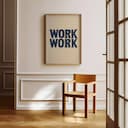 Room view with a full frame of A minimalist linocut print, the words "WORK"