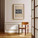 Room view with a matted frame of A minimalist linocut print, the words "WORK"