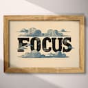 Full frame view of A vintage linocut print, the word "FOCUS" with clouds