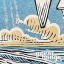 Closeup view of A vintage linocut print, the word "VACATION" with a beach