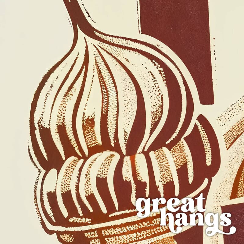 Closeup view of A vintage linocut print, the words "HAVE FUN" with ice cream