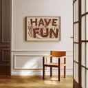 Room view with a full frame of A vintage linocut print, the words "HAVE FUN" with ice cream