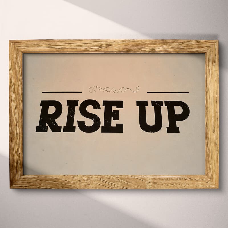 Full frame view of A retro letterpress print, the words "RISE UP"