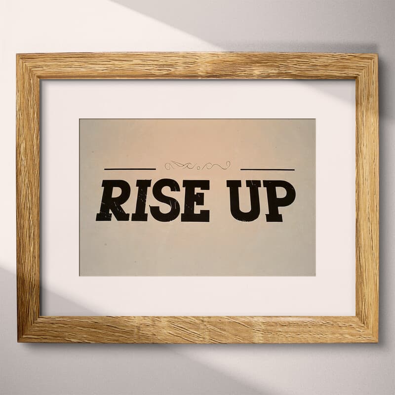 Matted frame view of A retro letterpress print, the words "RISE UP"