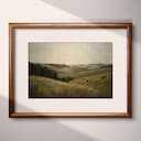 Matted frame view of An impressionist oil painting, rolling hills, cows in the distance, gray sky