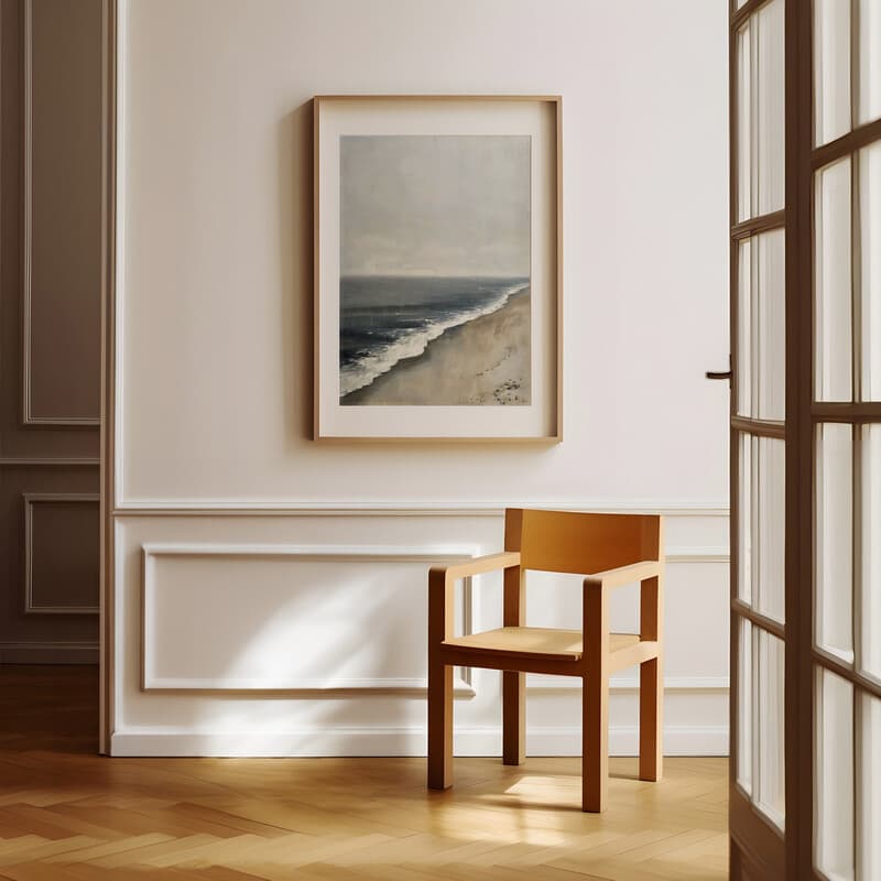 Room view with a matted frame of A rustic oil painting, a beach overlooking the ocean, gray sky