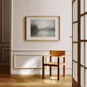 Room view with a matted frame of An impressionist oil painting, a lake, a mountain and trees in the distance, gray sky