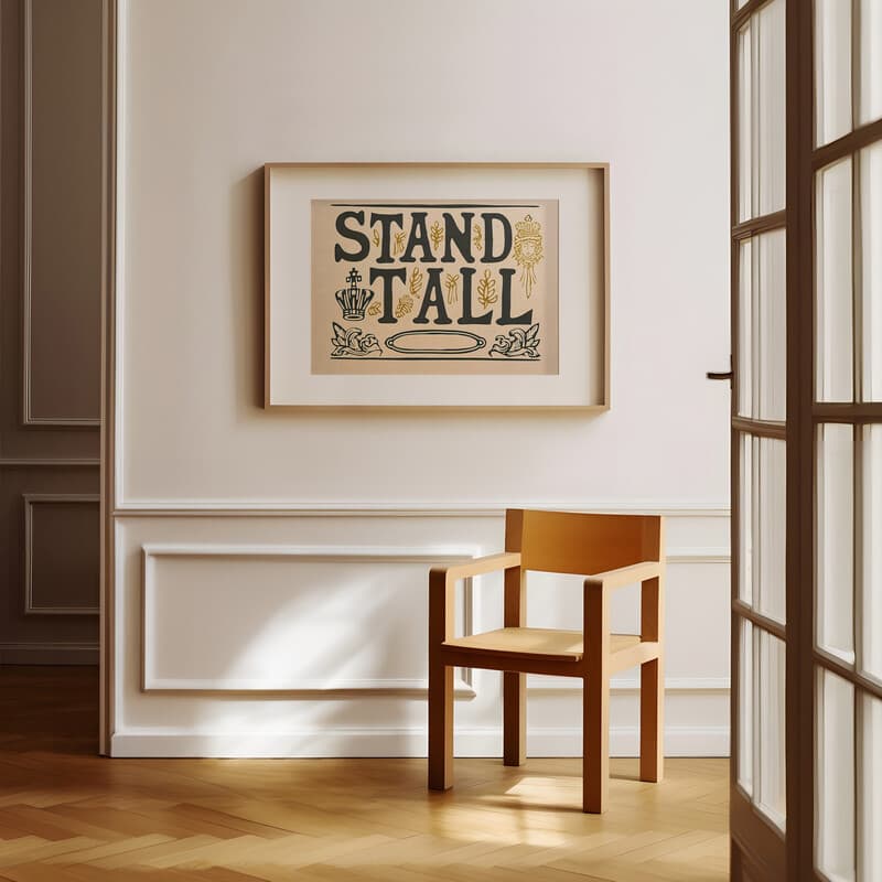 Room view with a matted frame of A vintage linocut print, the words "STAND TALL" with a crown