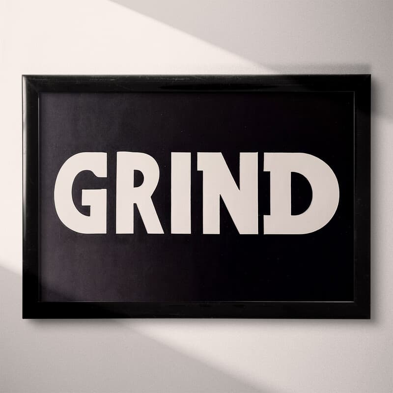 Full frame view of A minimalist letterpress print, the word "GRIND"