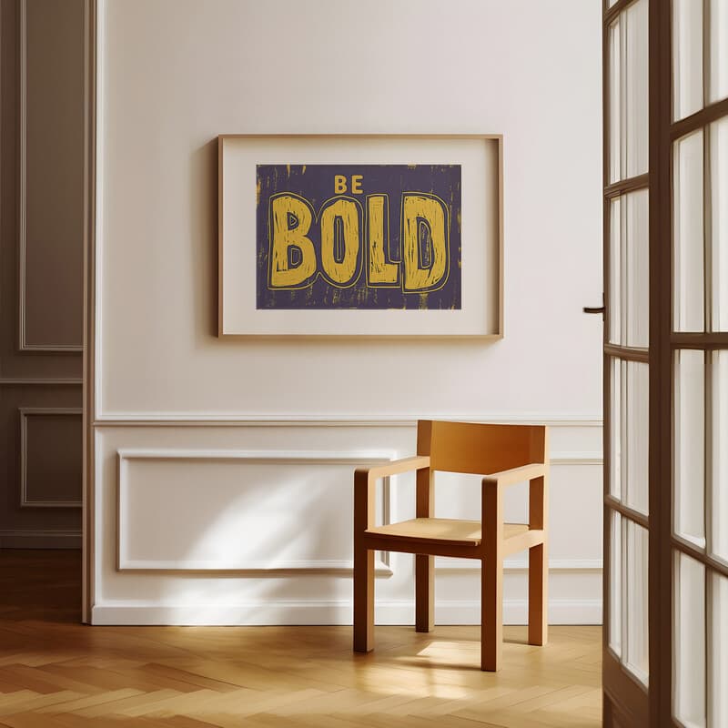 Room view with a matted frame of A retro linocut print, the words "BE BOLD"