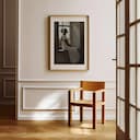 Room view with a matted frame of An afrofuturism oil painting, a woman in a white dress sitting at a window sill