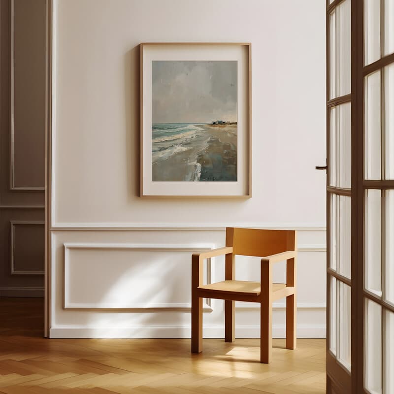 Room view with a matted frame of An impressionist oil painting, beach and ocean, a lake house in the distance, gray sky