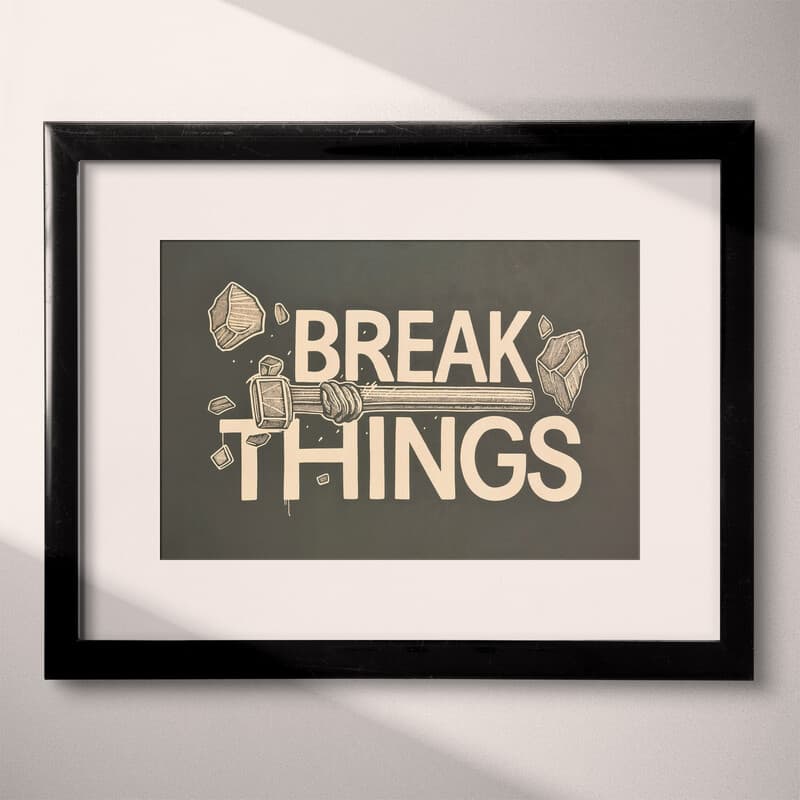 Matted frame view of A vintage linocut print, the words "BREAK THINGS" with a hammer