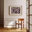 Room view with a matted frame of A vintage linocut print, the words "BE EPIC"