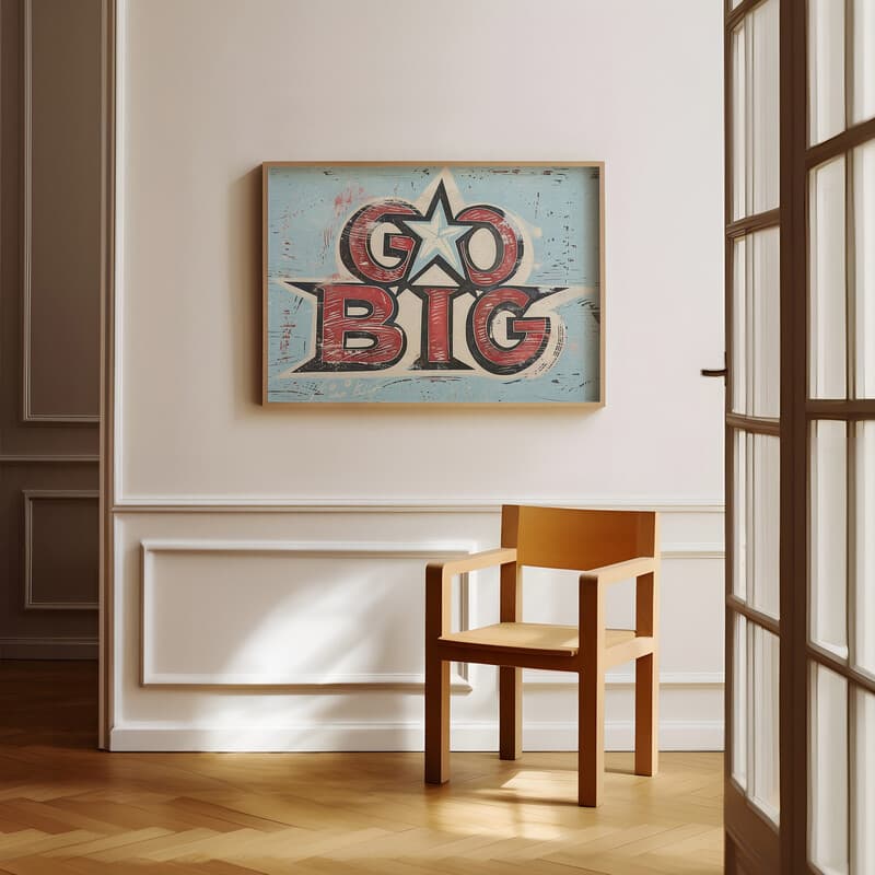 Room view with a full frame of A vintage linocut print, the words "GO BIG" with a star