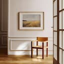 Room view with a matted frame of A farmhouse oil painting, a wheat field, gray sky