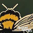 Closeup view of A vintage linocut print, the words "BEE HUMBLE" with a bee