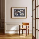 Room view with a matted frame of A vintage linocut print, the words "FLY HIGH" with an eagle