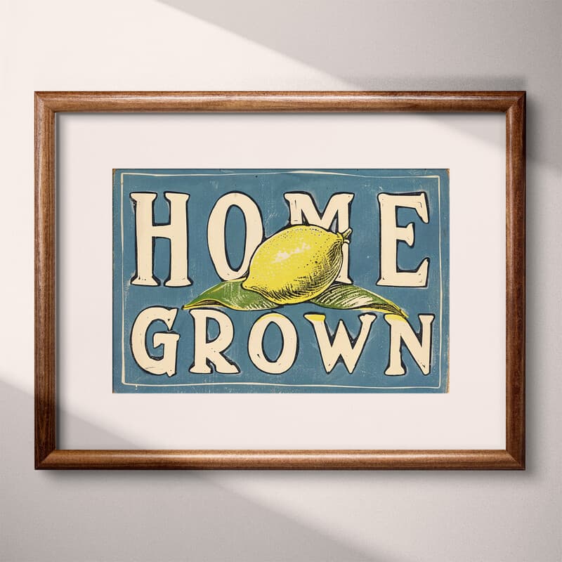 Matted frame view of A vintage linocut print, the words "HOME GROWN" with a lemon