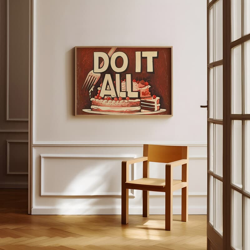 Room view with a full frame of A vintage linocut print, the words "DO IT ALL" with a cake