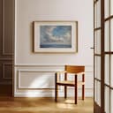 Room view with a matted frame of An impressionist oil painting, birds in the sky over the sea, clouds