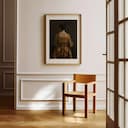 Room view with a matted frame of A vintage oil painting, a woman in a gold dress sitting in a chair, back view