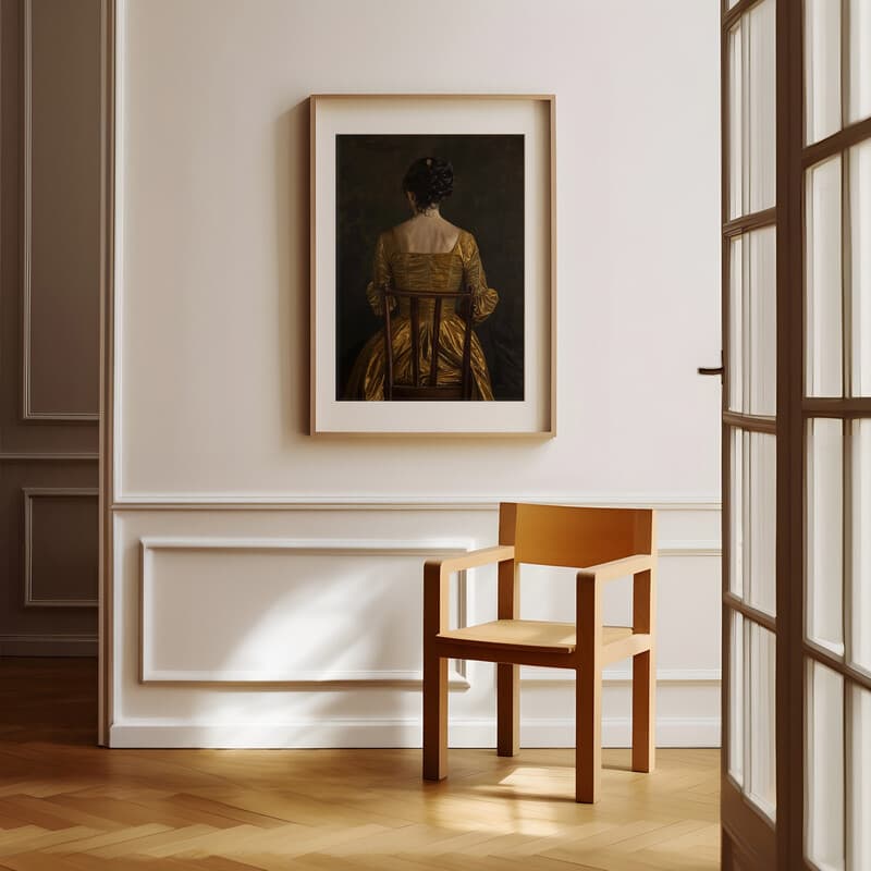 Room view with a matted frame of A vintage oil painting, a woman in a gold dress sitting in a chair, back view