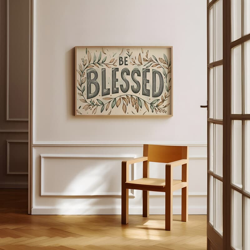 Room view with a full frame of A vintage linocut print, the words "BE BLESSED" with a vine