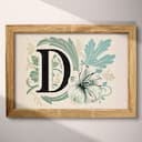 Full frame view of A vintage linocut print, the letter "D" with a flower