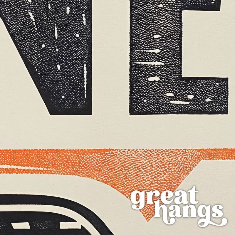 Closeup view of A vintage linocut print, the words "WINNER" with a checkered flag