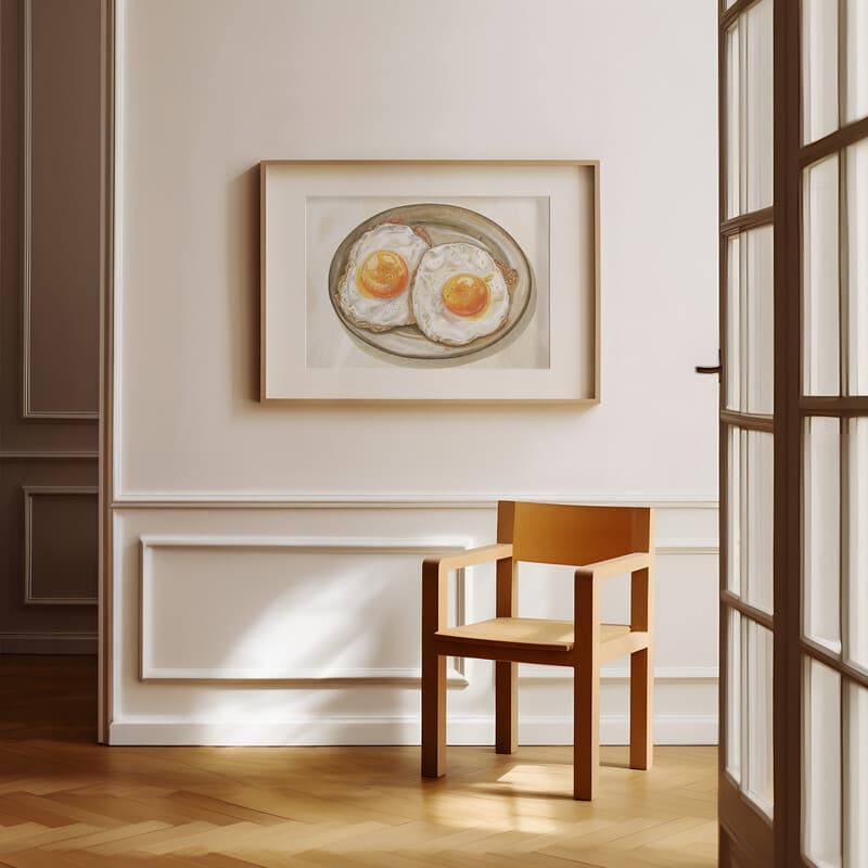 Room view with a matted frame of A rustic pastel pencil illustration, sunny side up eggs on a plate, overhead view