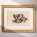 Matted frame view of A cute chibi anime pastel pencil illustration, a tiger