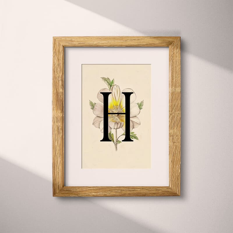 Matted frame view of A vintage pastel pencil illustration, the letter "H" with a flower