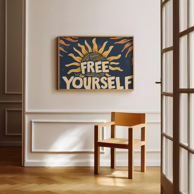 Room view with a full frame of A vintage linocut print, the words "FREE YOURSELF" with a sun