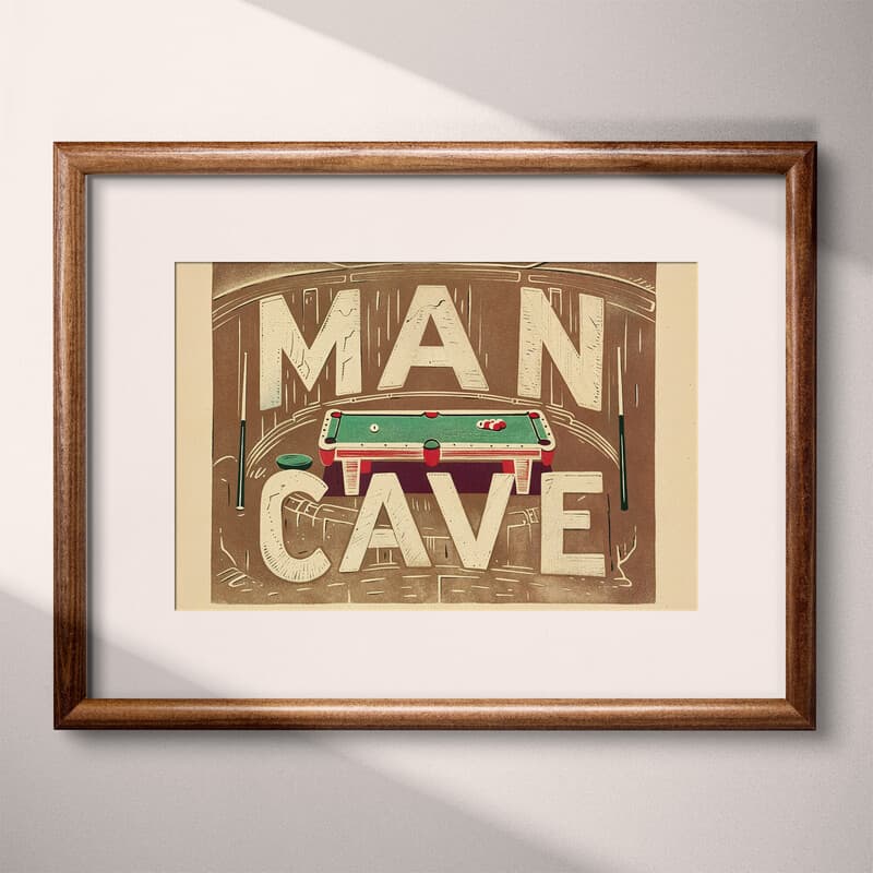 Matted frame view of A vintage linocut print, the words "MAN CAVE" with a pool table