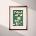 Matted frame view of A vintage linocut print, the words "PLEASE BE SEATED" with a toilet